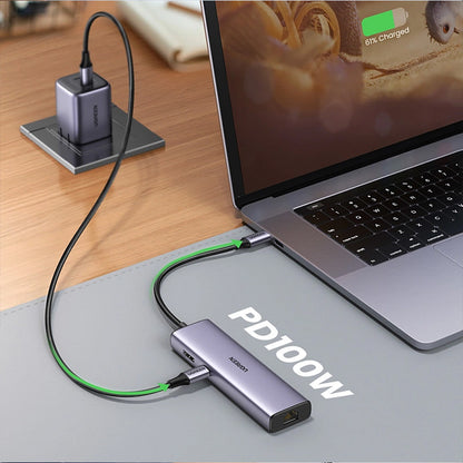 Adaptor multifunctional UGREEN USB C CM512, 2 x USB-A 3.0, 1 x USB-C, 1 x HDMI, 1 x RJ45, 1 x SD, 1 x microSD, Gri